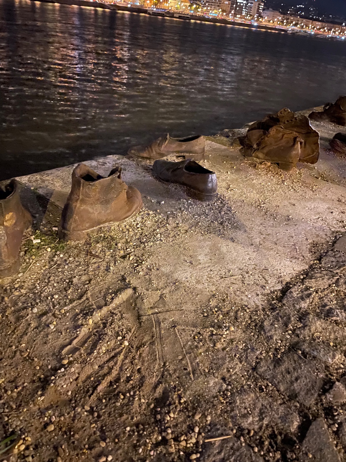 Shoes on the Danube Bank memorial at night
