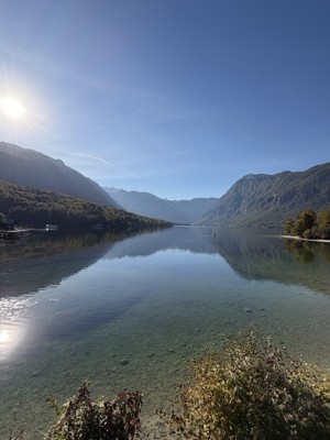 Mountains reflected in a still Lake Bohinj